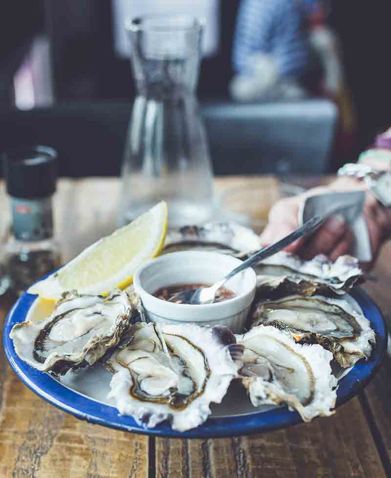 raw oysters on plate