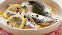 Fresh herrings in lemon