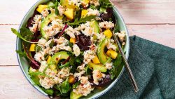bowl of crab salad with mango and avocado