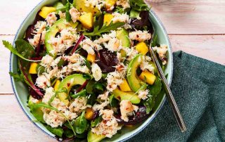 bowl of crab salad with mango and avocado